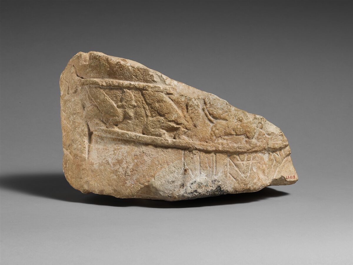Fragment of an male limestone votary with an Egyptianizing kilt, Limestone, Cypriot 