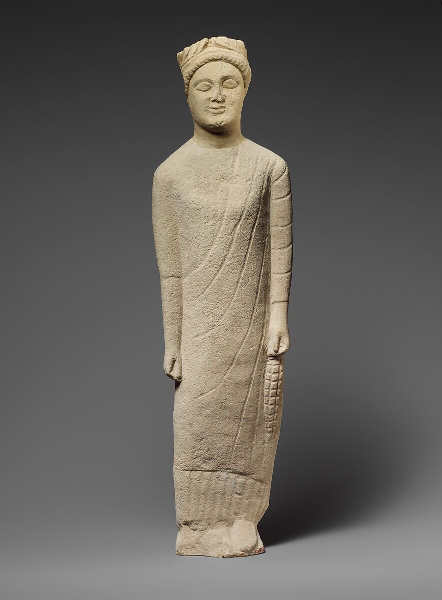 Limestone statuette of a beardless male votary with a wreath of leaves, Limestone, Cypriot 