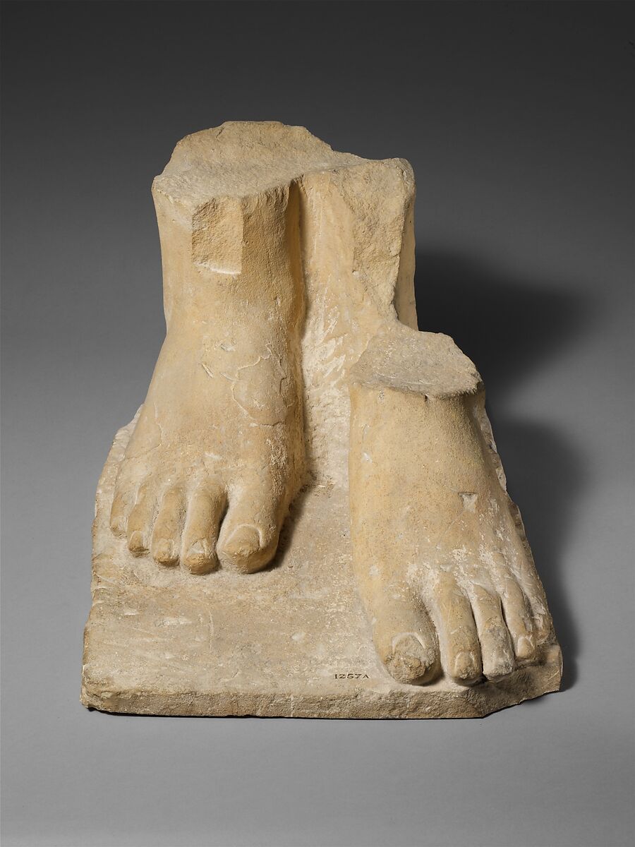 Limestone plinth with the feet of a colossal male statue, Limestone, Cypriot 