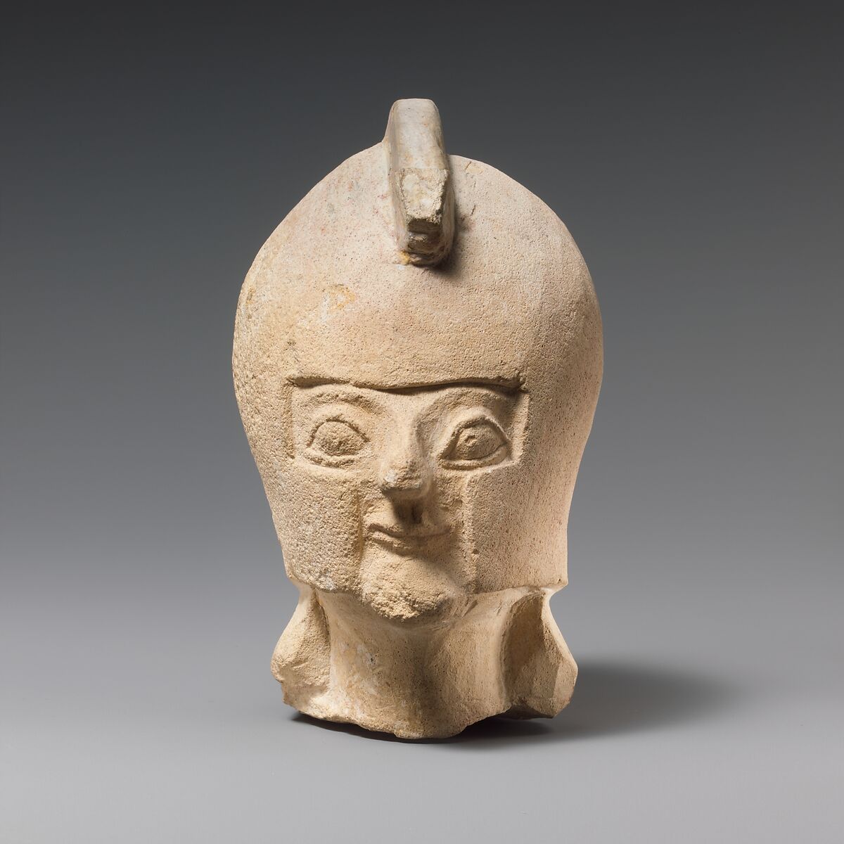 Limestone head of a warrior wearing a crested helmet, Limestone, Cypriot 