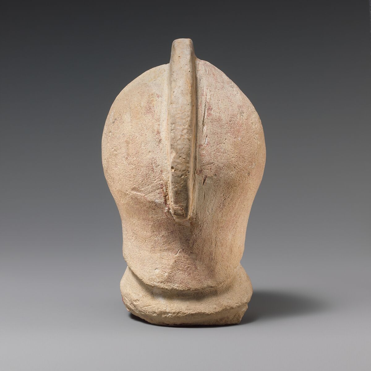 Limestone head of a warrior wearing a crested helmet, Limestone, Cypriot