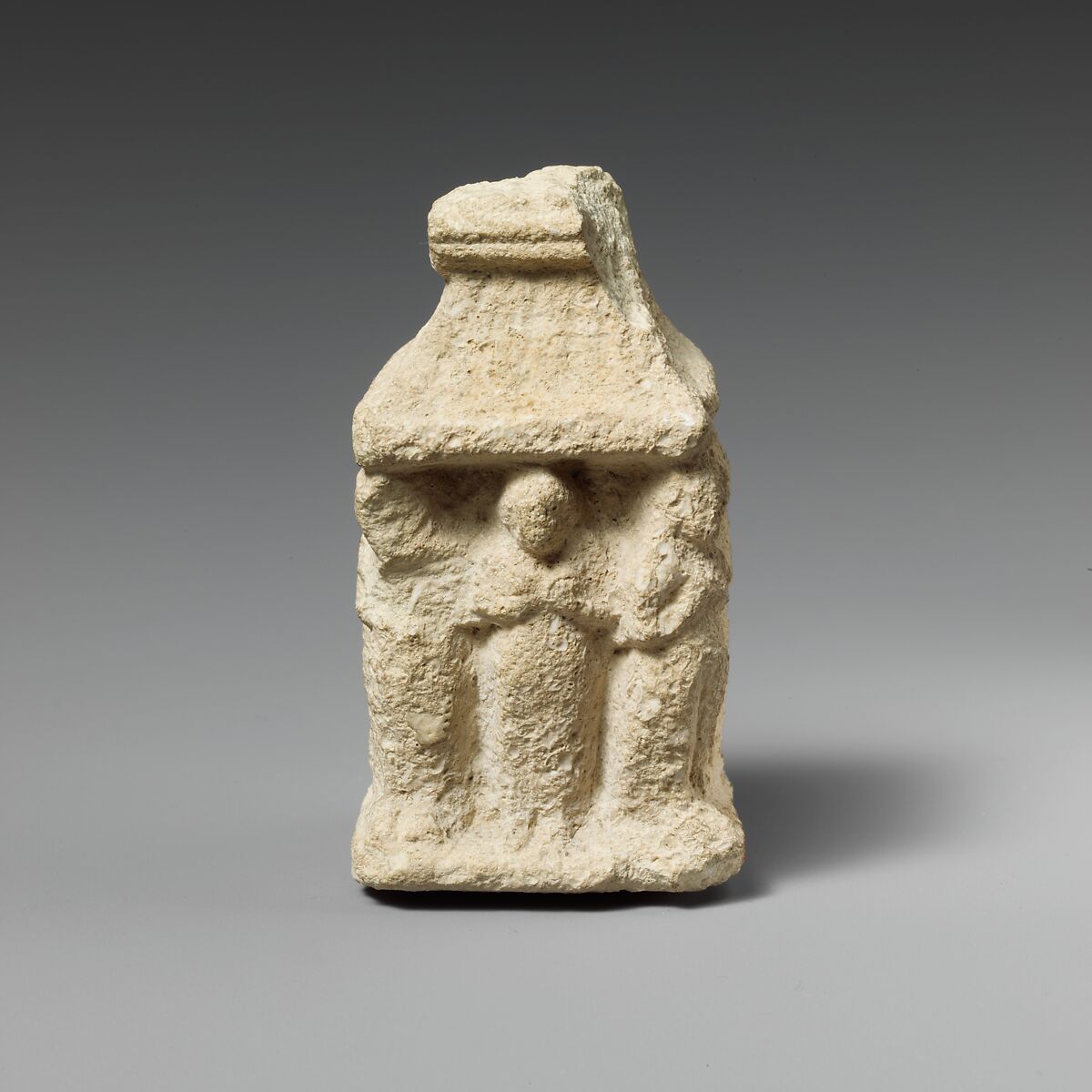 Limestone naiskos with female figures holding their breasts, Limestone, Cypriot 