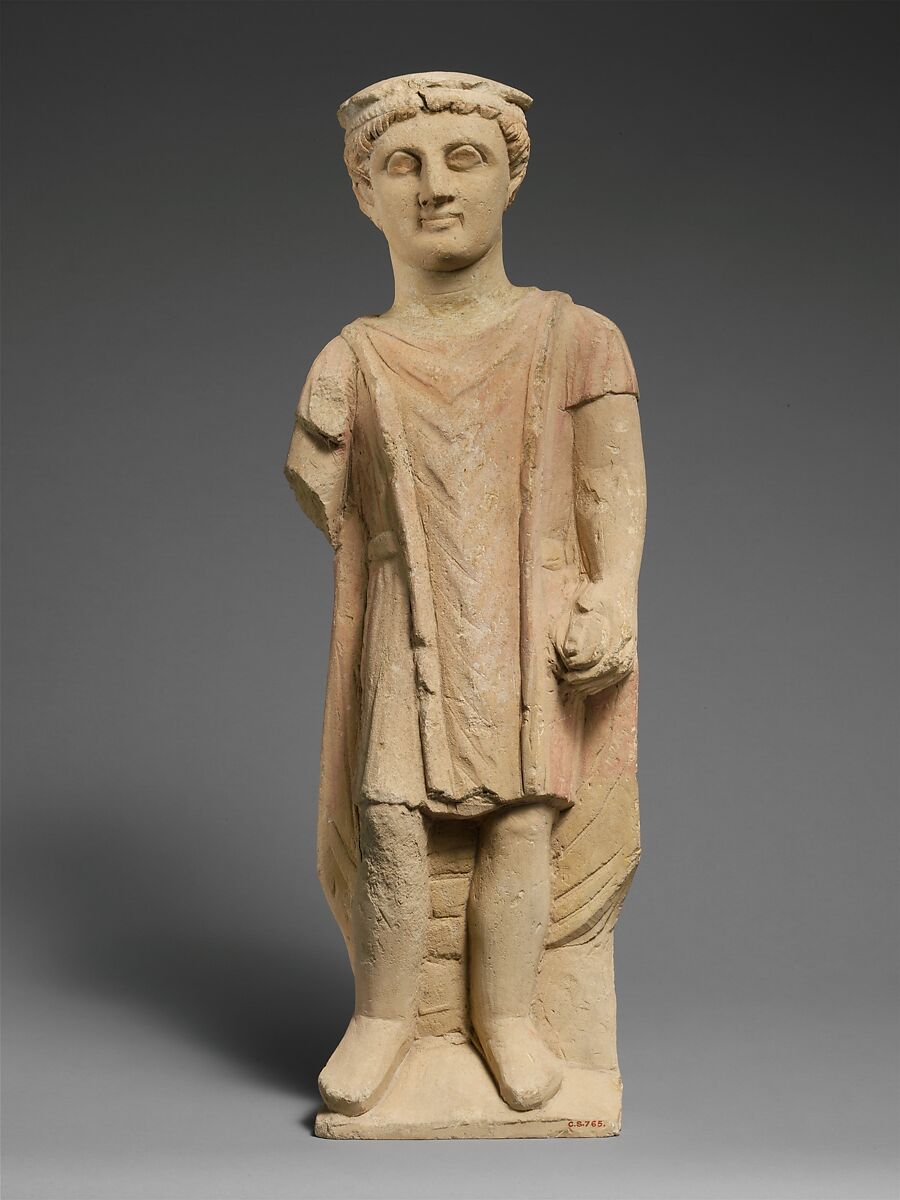 Limestone statuette of a boy holding a pyxis, Limestone, Cypriot