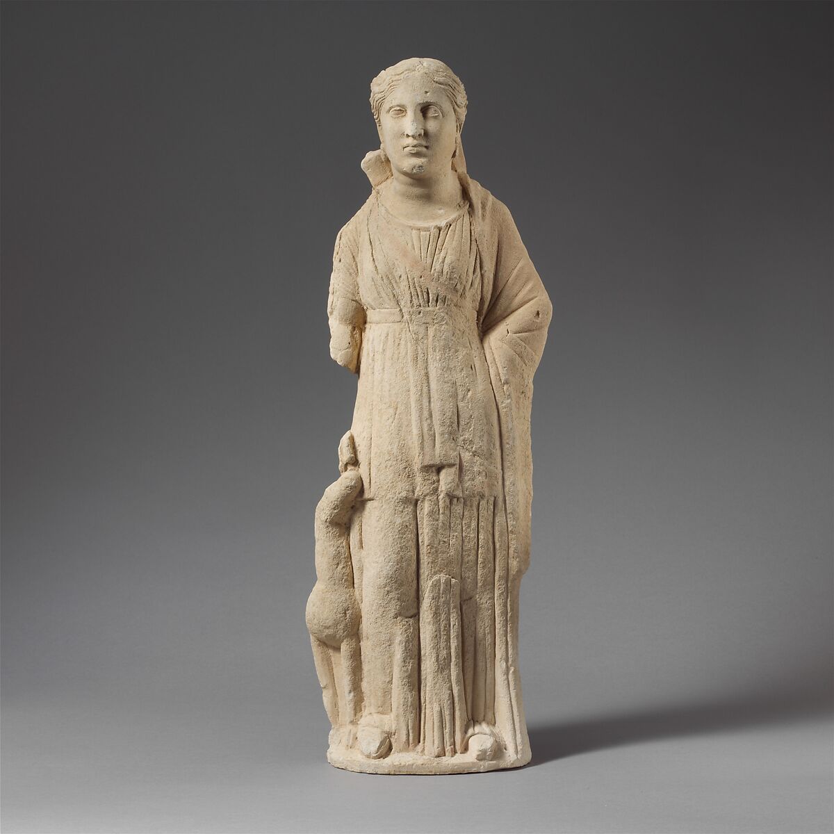 Limestone statuette of Artemis with a fawn, Limestone, Cypriot 