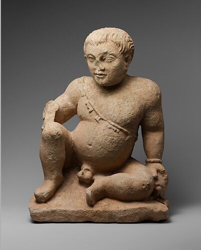 Limestone statuette of a temple boy