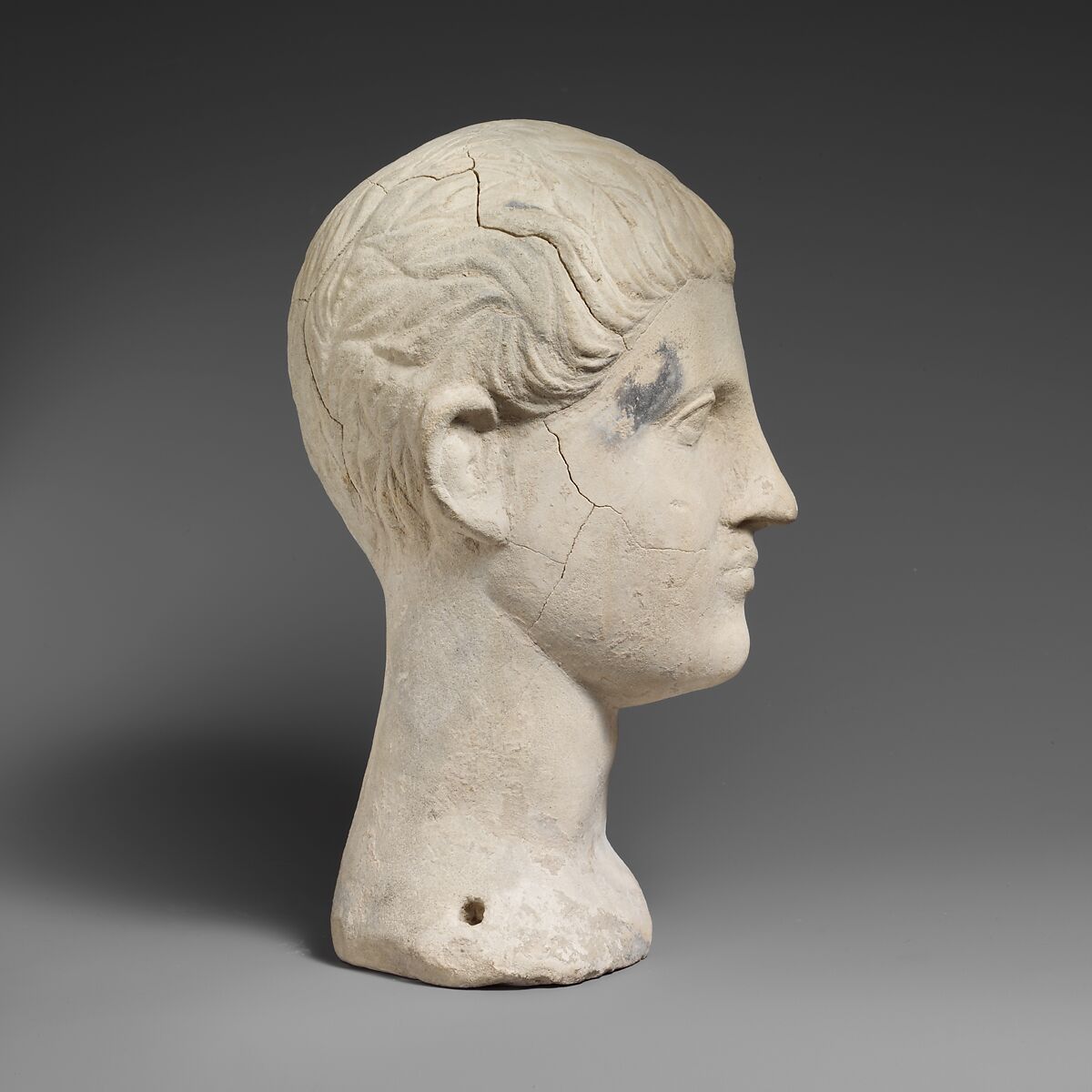 Limestone funerary bust of a beardless man, Limestone, Cypriot