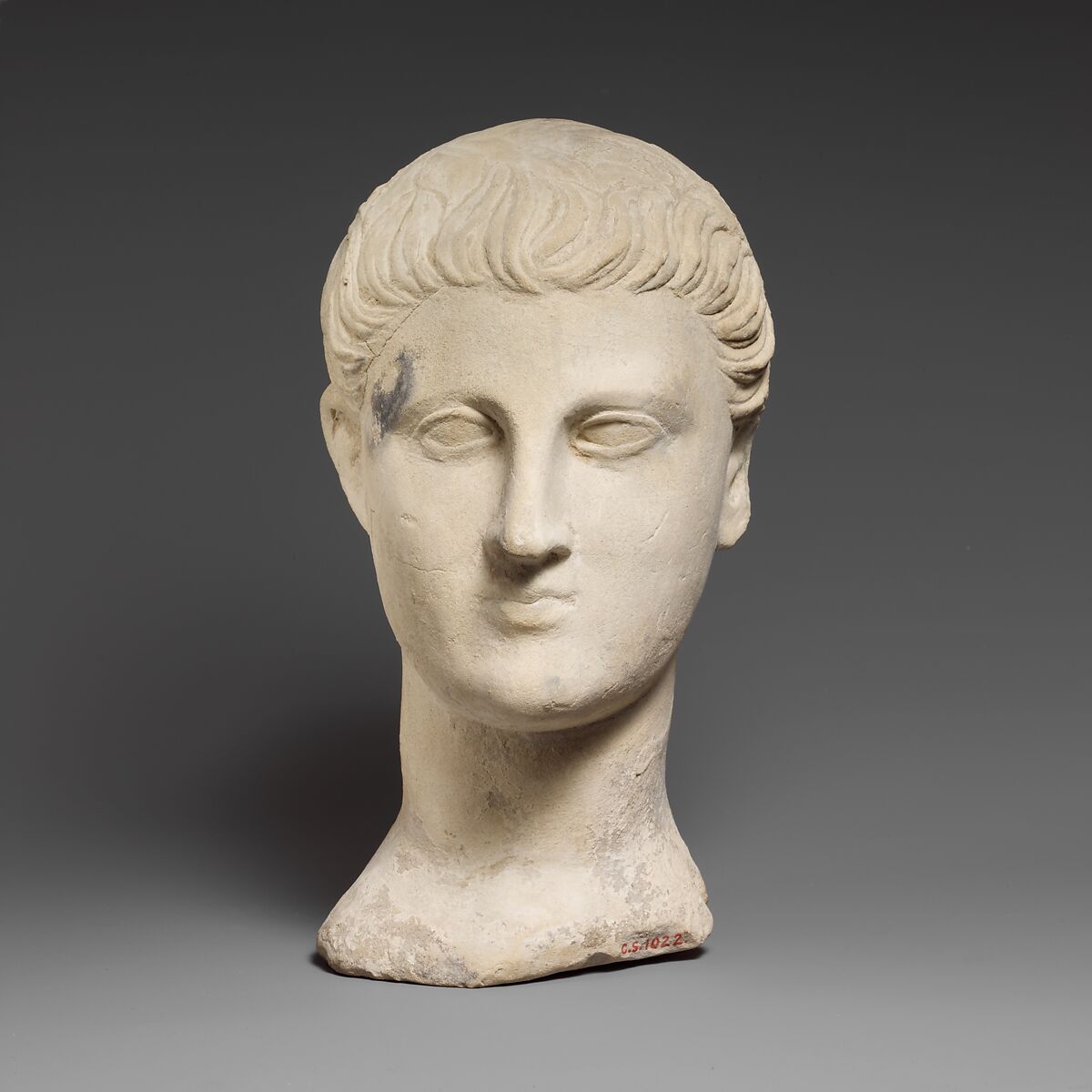 Limestone funerary bust of a beardless man, Limestone, Cypriot 