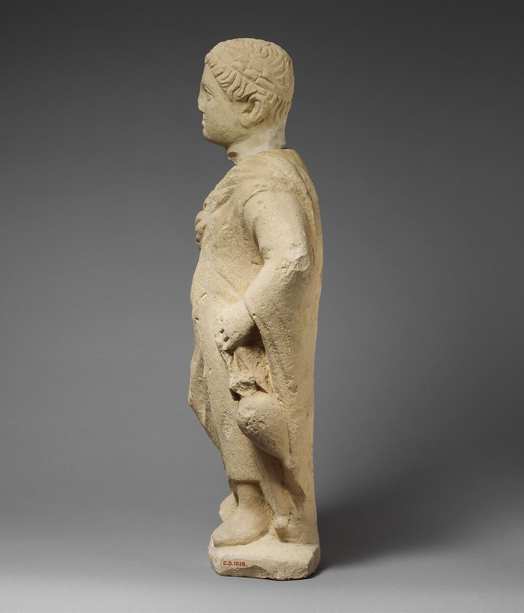Limestone statuette of a boy holding an amphora, Limestone, Cypriot