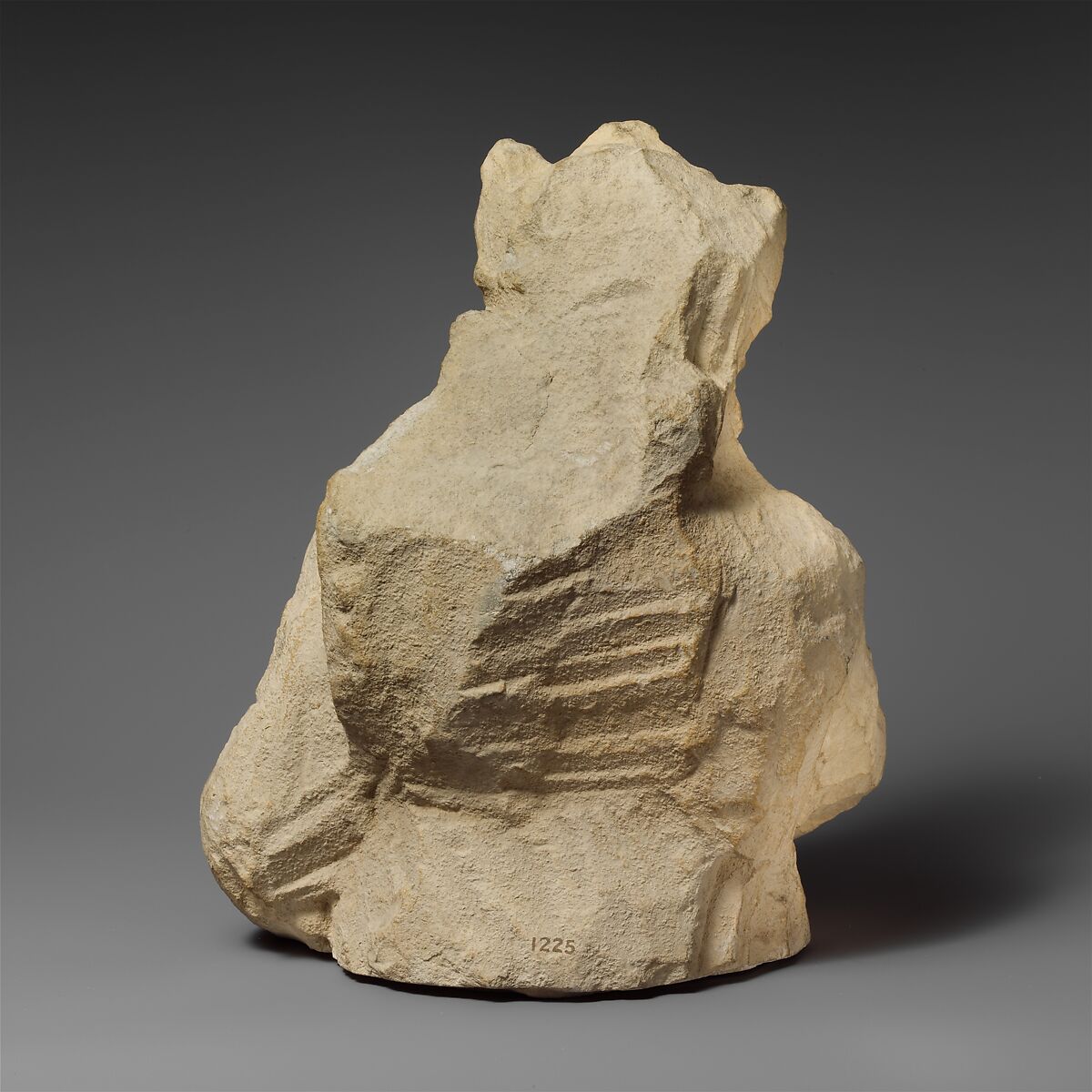 Fragment of a partly unfinished limestone statuette of a silen, Limestone, Cypriot