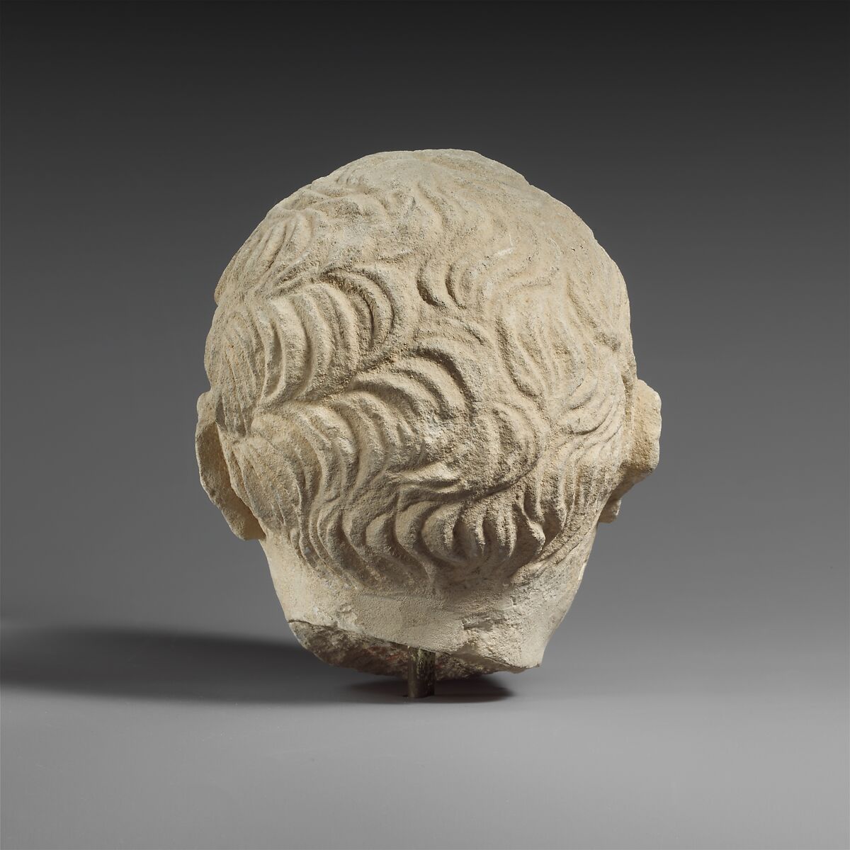 Limestone head of a boy, Limestone, Cypriot