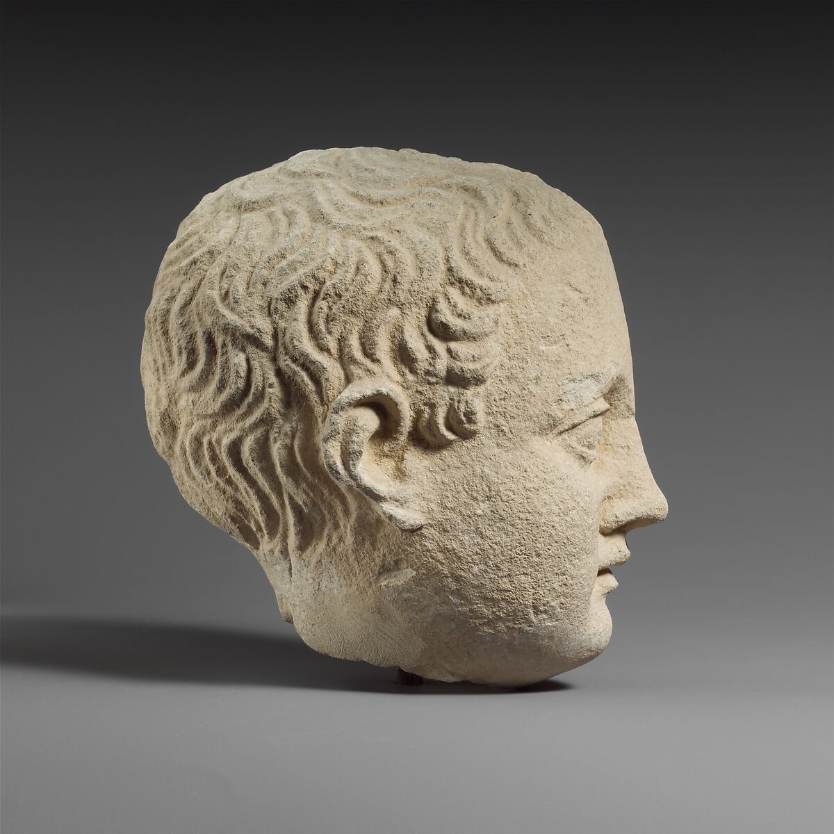 Limestone head of a boy, Limestone, Cypriot
