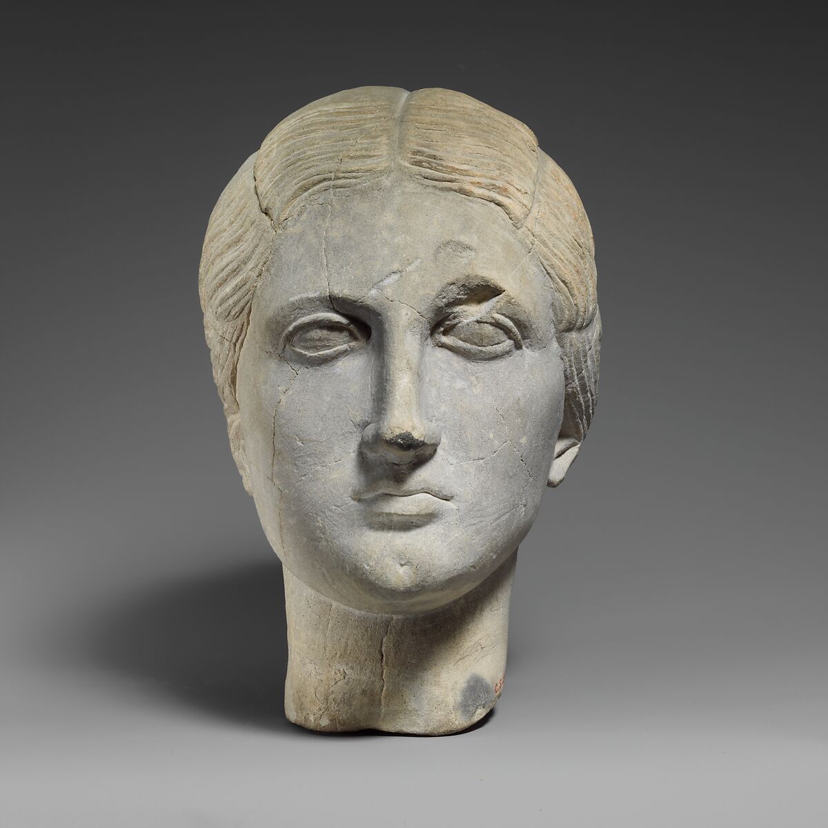 Limestone funerary bust of a woman, Limestone, Cypriot 