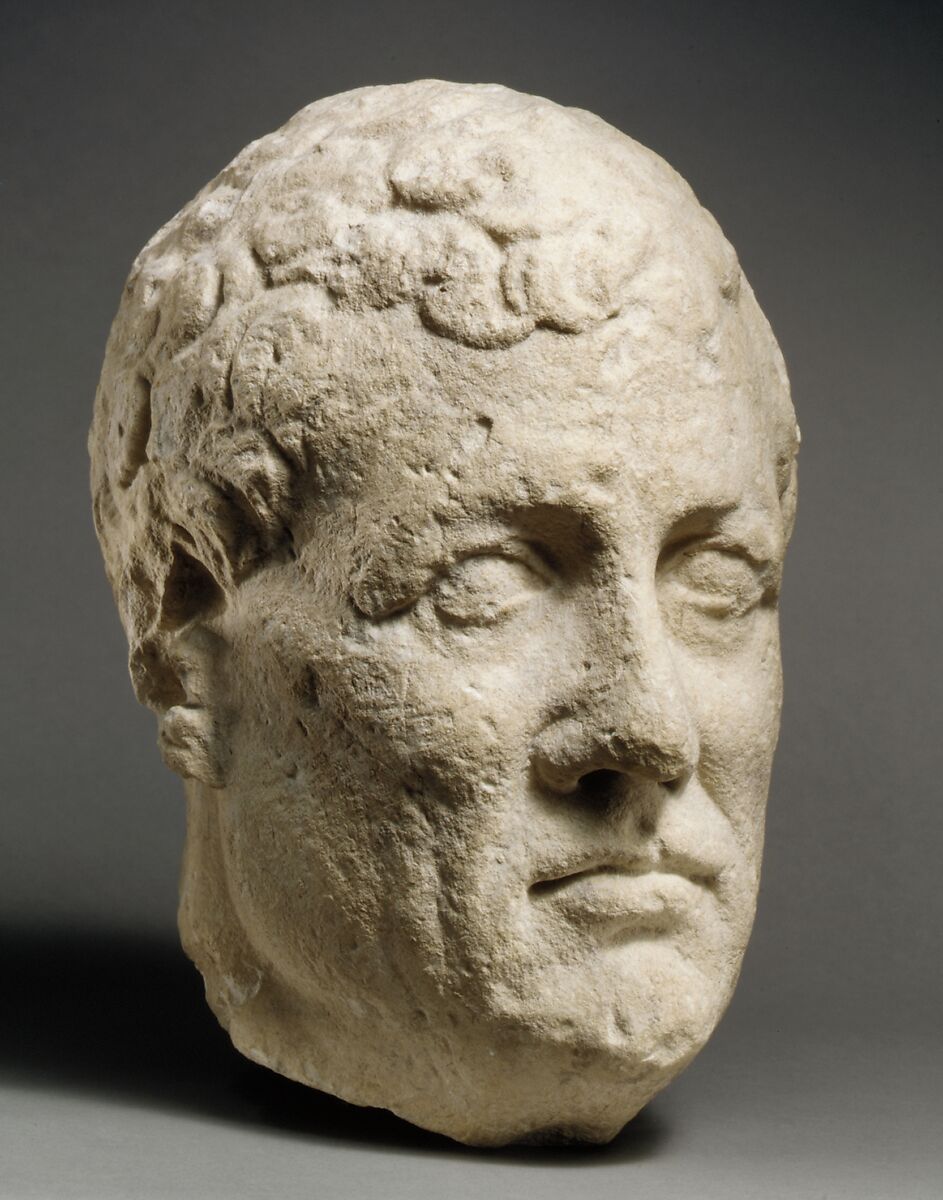 Limestone head of beardless male votary, Limestone, Cypriot