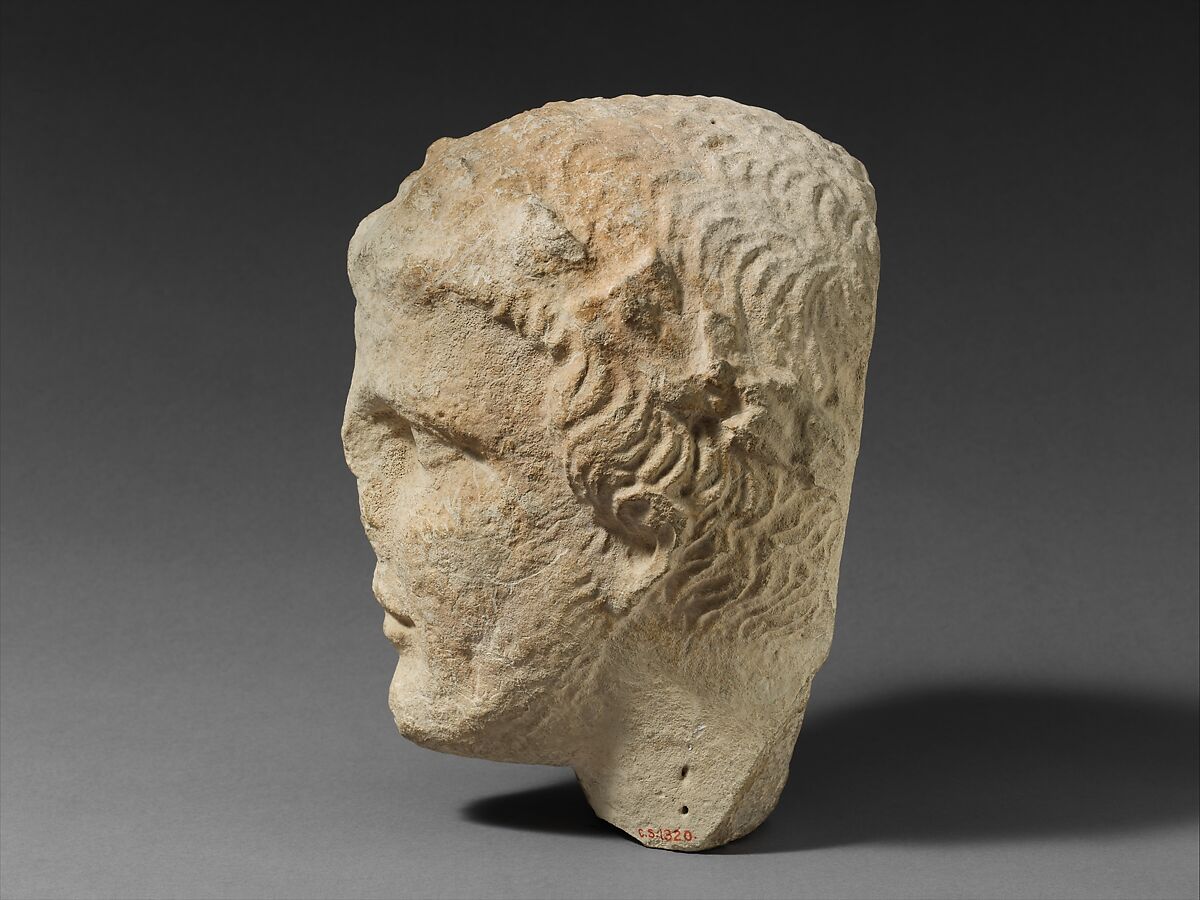 Limestone head of a bearded male votary, Limestone, Cypriot