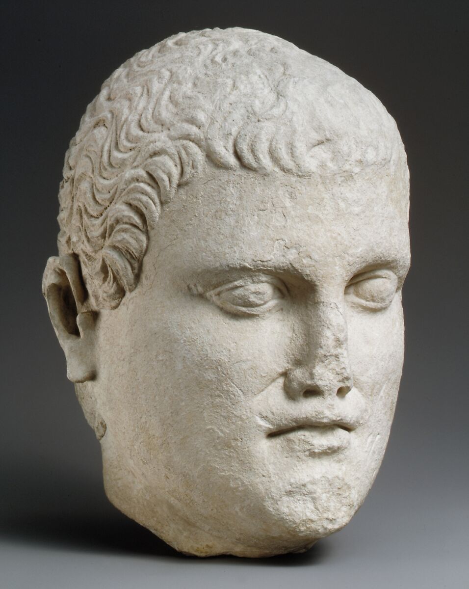 Limestone head of beardless male votary, Limestone, Cypriot