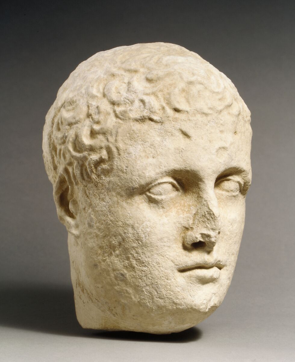 Limestone head of a beardless male votary, Limestone, Cypriot