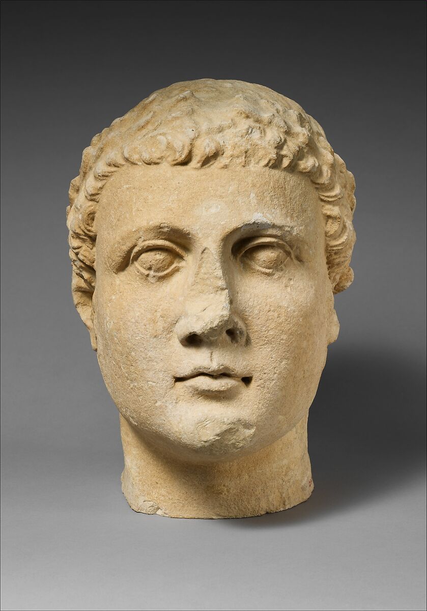 Limestone head of beardless male votary, Limestone, Cypriot 