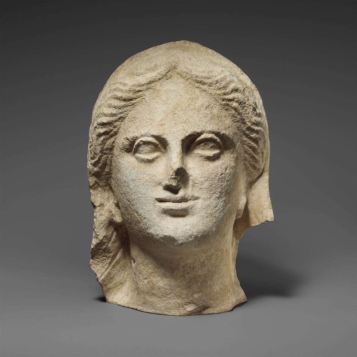 Limestone head of a veiled female votary | Cypriot | Hellenistic | The ...