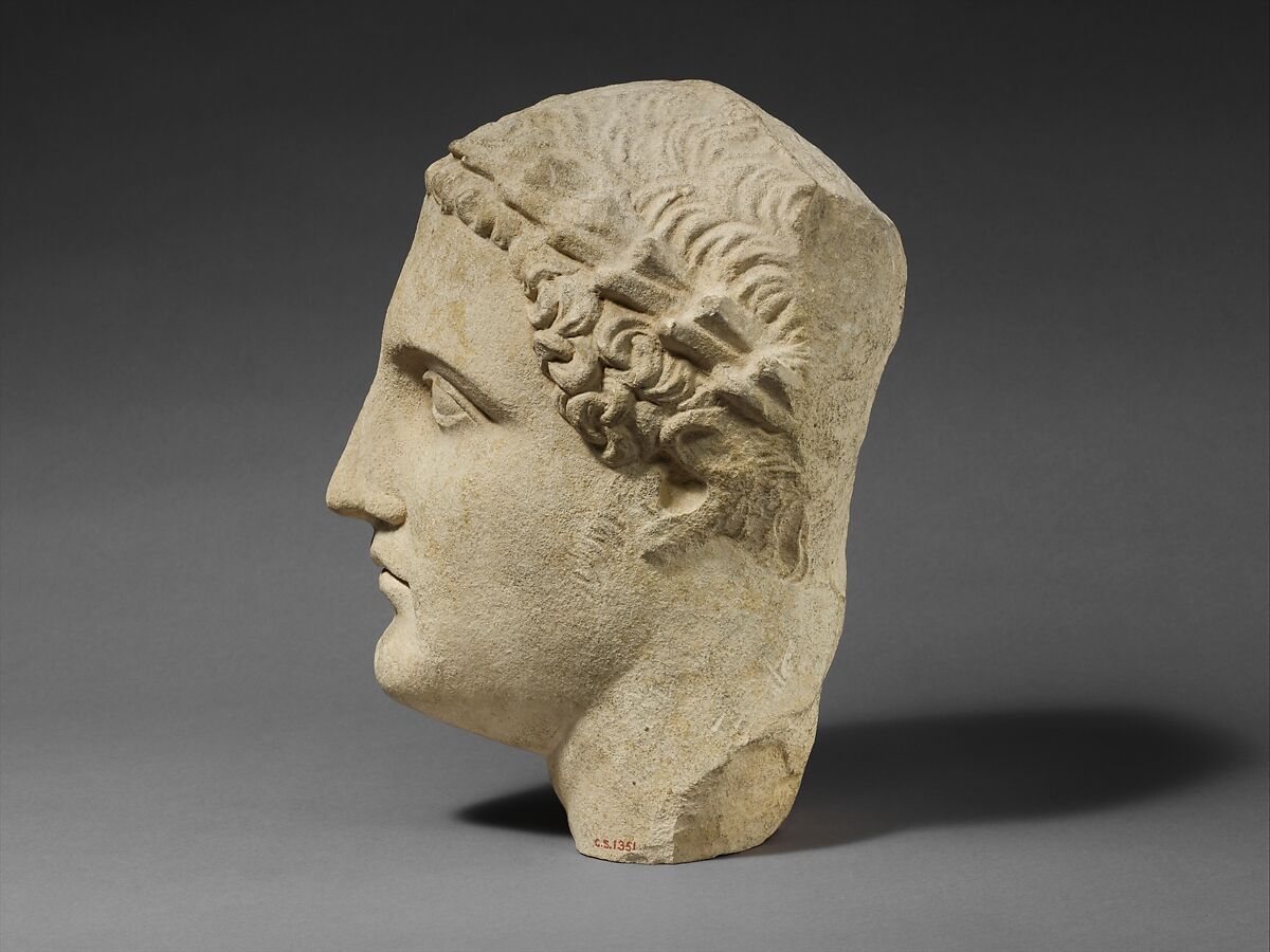 Limestone head of a beardless male votary, Limestone, Cypriot