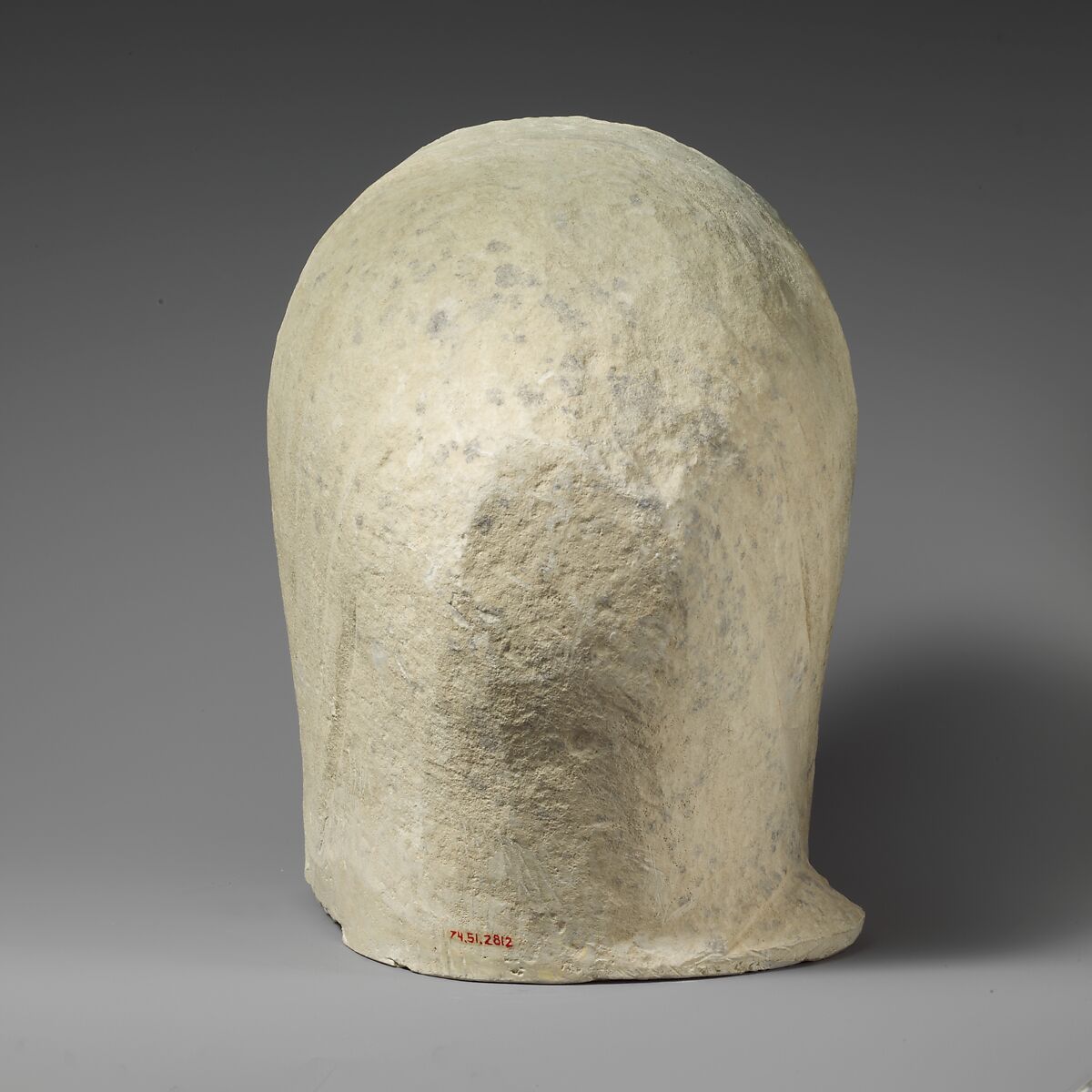 Limestone head of a veiled female votary, Limestone, Cypriot