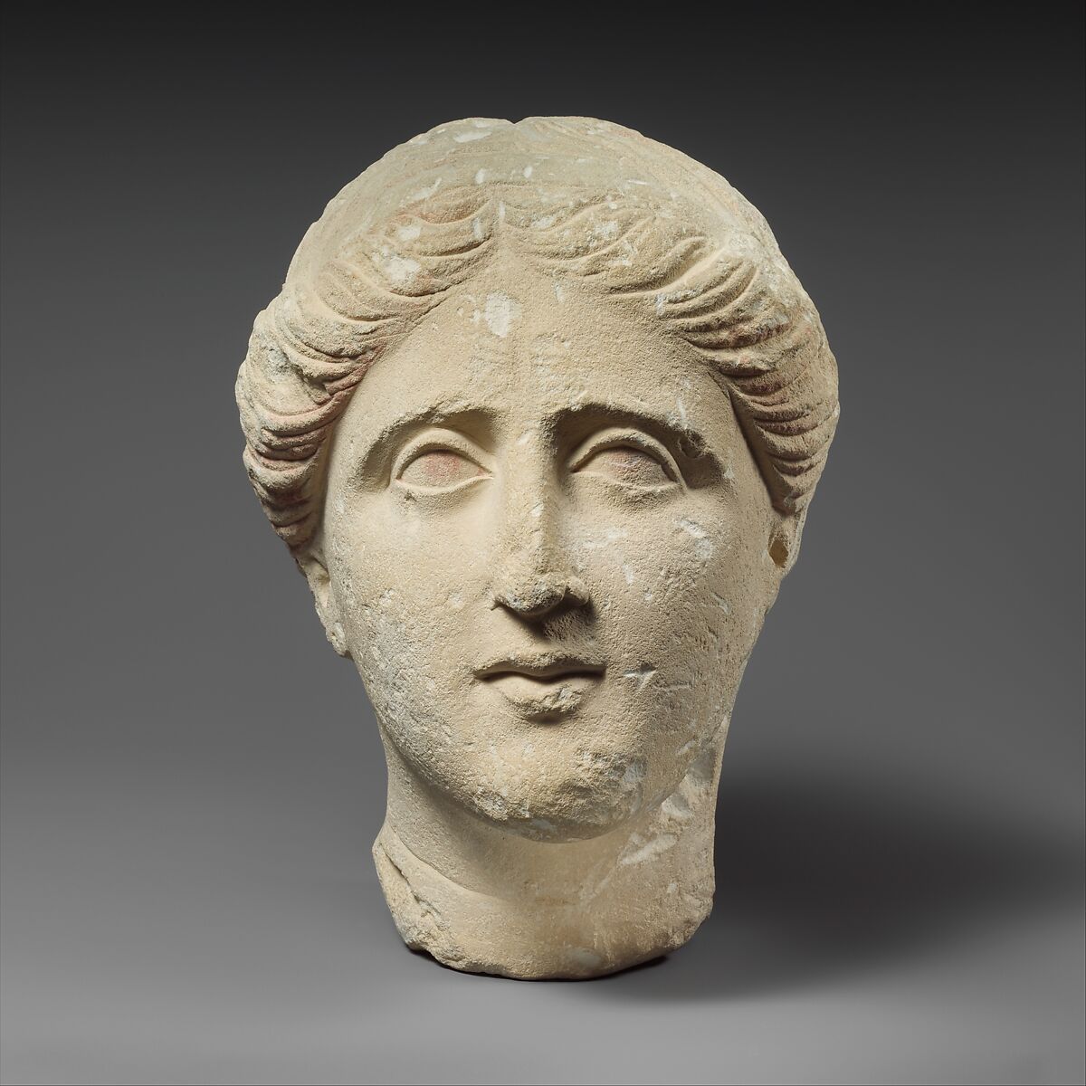 Limestone head of a female votary, Limestone, Cypriot 
