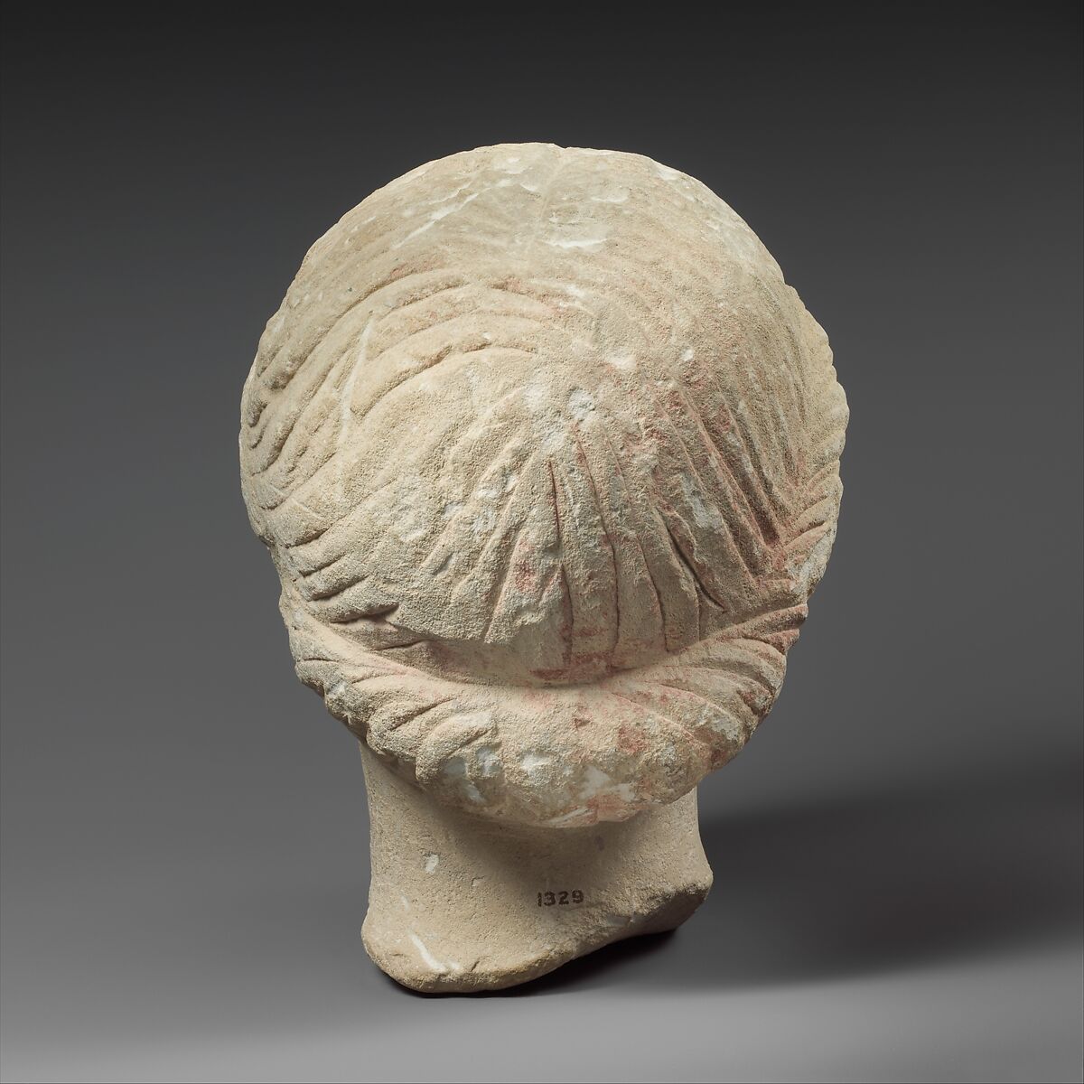 Limestone head of a female votary, Limestone, Cypriot