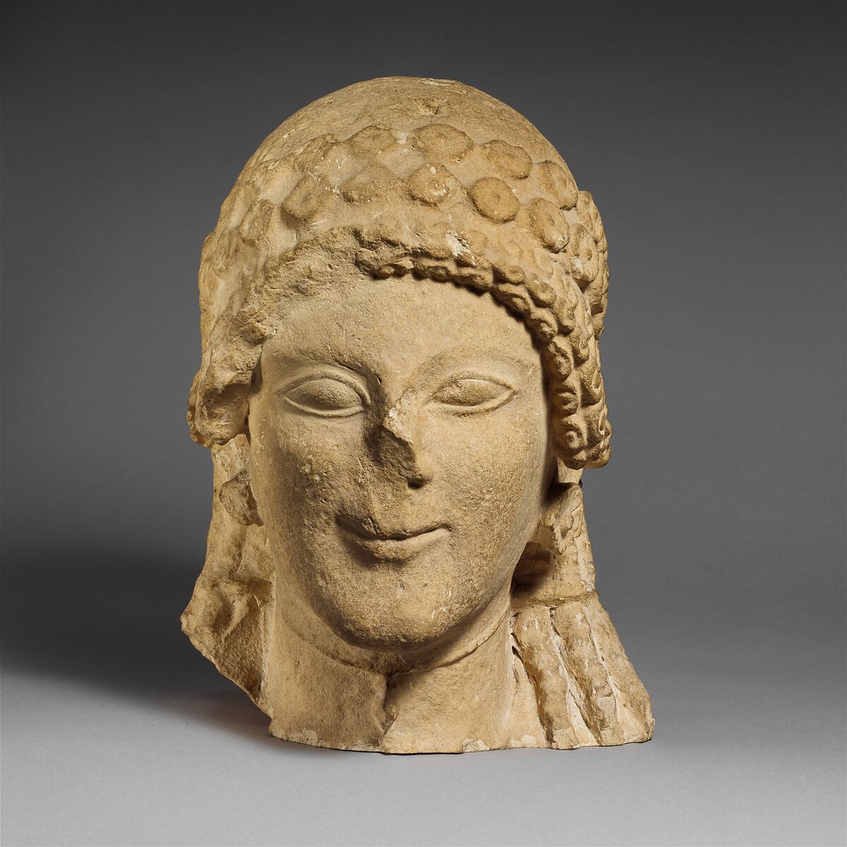 Limestone head of a female votary, Limestone, Cypriot 