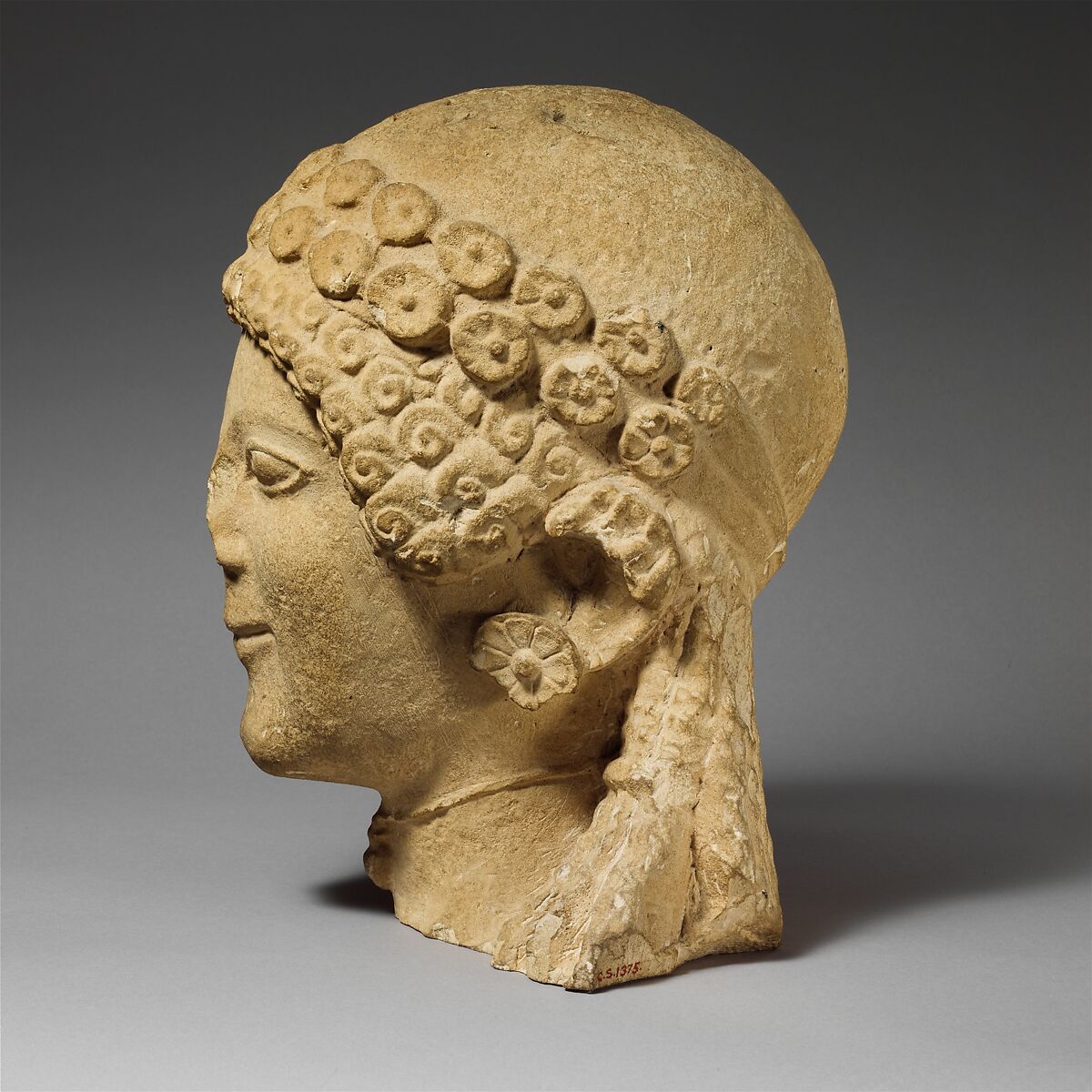Limestone head of a female votary, Limestone, Cypriot