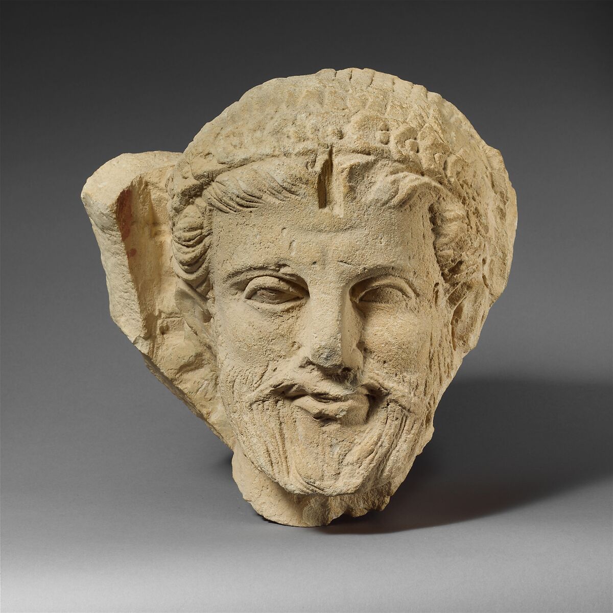 Limestone head of a bearded man from a funerary stele, Limestone, Cypriot 