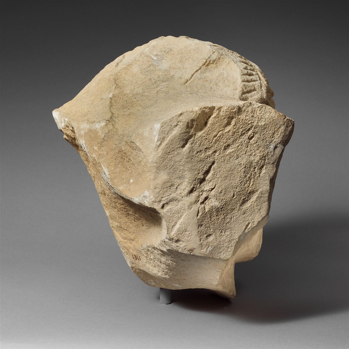 Limestone head of a bearded man from a funerary stele, Limestone, Cypriot