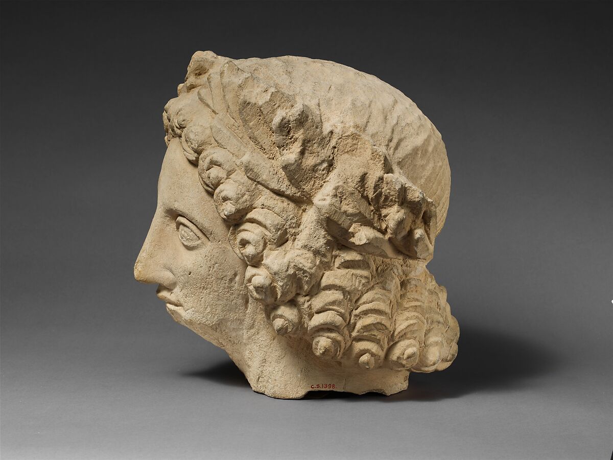 Limestone head of Apollo, Limestone, Cypriot