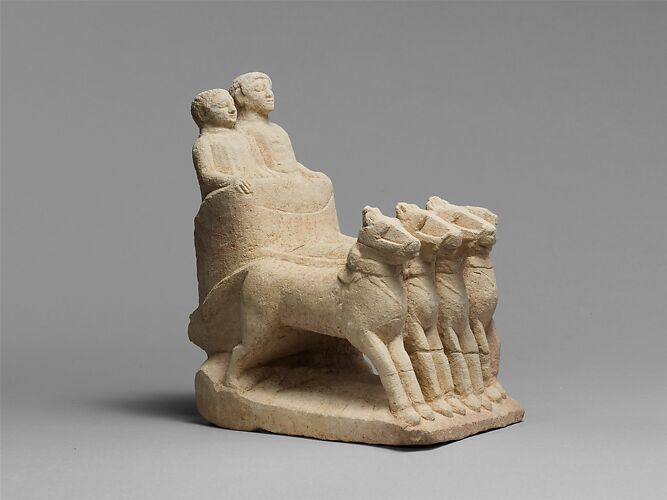 Limestone votive chariot with four horses and two figures