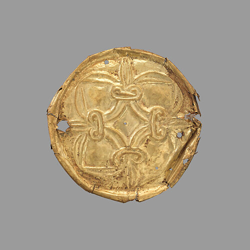 Gold roundel with stamped designs