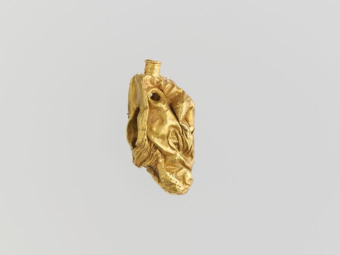 Gold pendant in the form of a bull's head