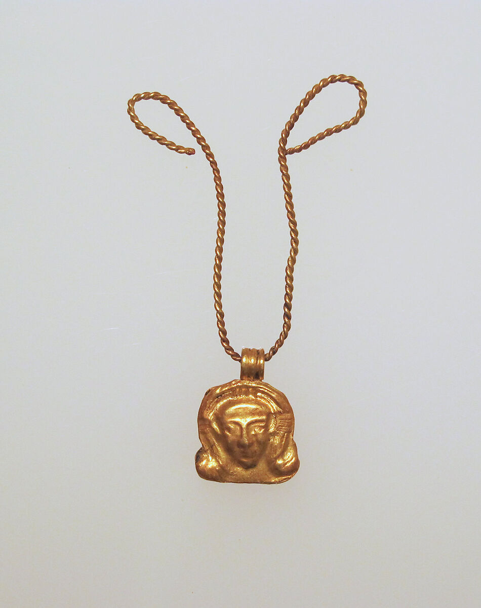 Pendant in the form of Hathor's head, Gold 