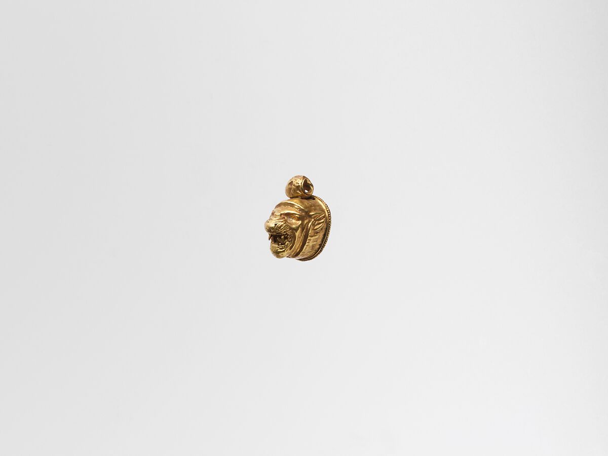 Gold pendant in the form of a lion's head, Gold, Cypriot 