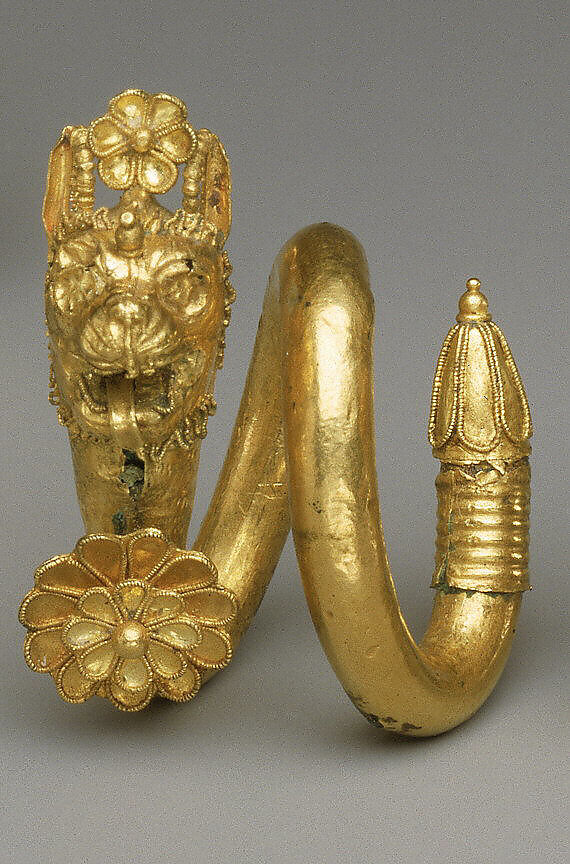 Gold and copper alloy spiral earring with lion-griffin head terminal, Gold, Greek, Cypriot