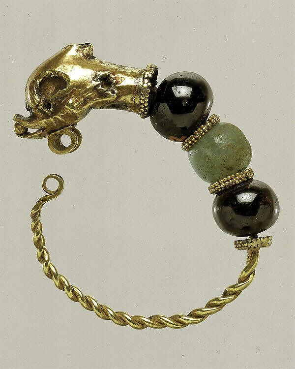 Gold, beryl, and garnet earring with head of a doplhin, Gold, beryl, garnet, Cypriot
