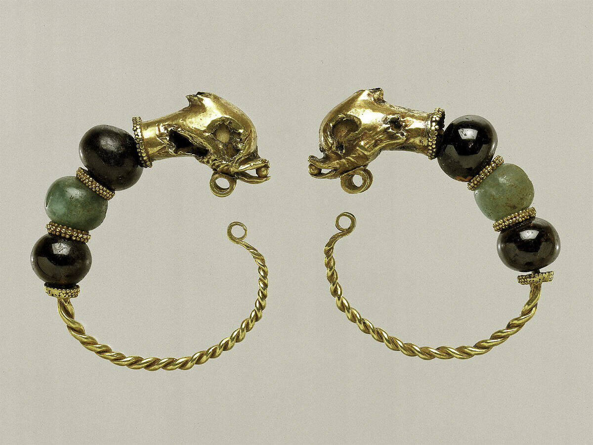 Gold, beryl, and garnet earring with head of a doplhin, Gold, beryl, garnet, Cypriot