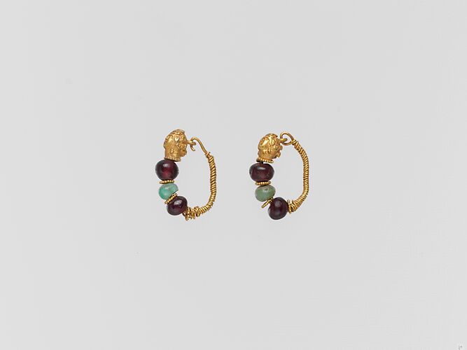 Gold earring with woman's head and beryl and garnet beads