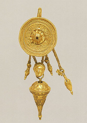 Gold disk earring with a female head and cone pendants
