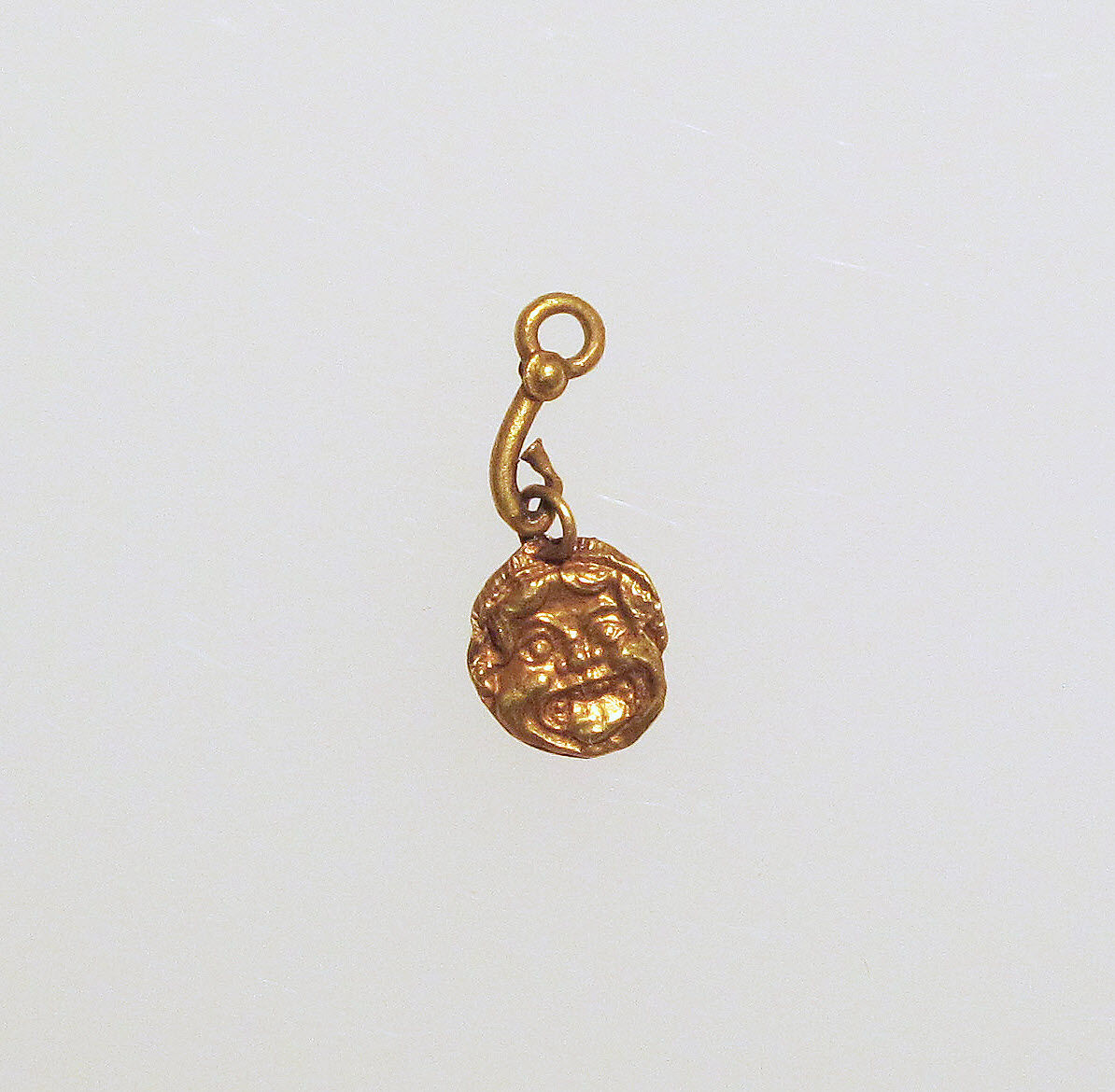 Pendant in the form of a Gorgoneion eye charm, Gold 