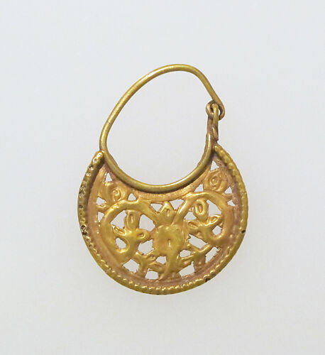 Gold lunate earring with scrolls
