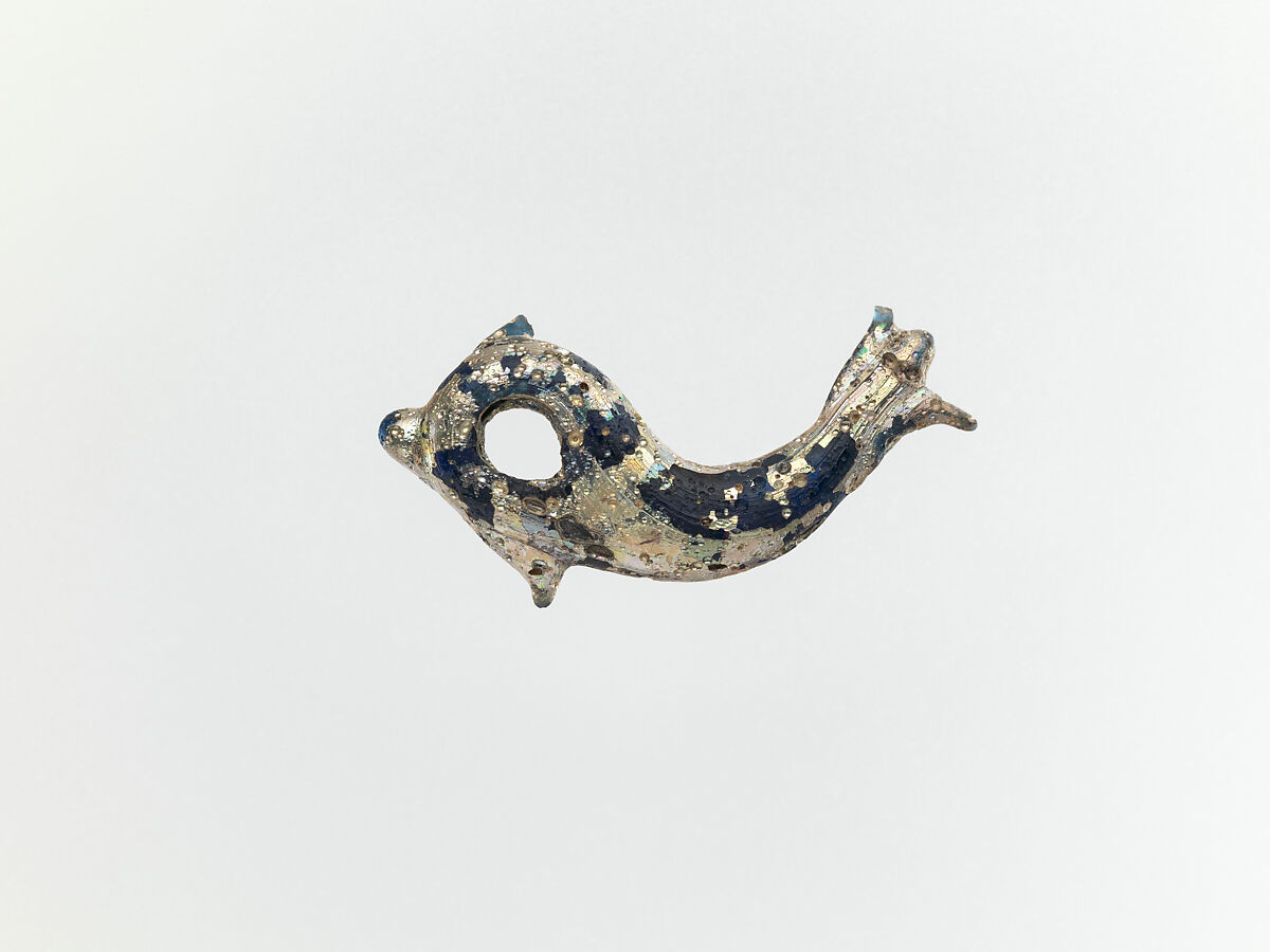 Glass pendant in the form of a dolphin, Glass, Roman 