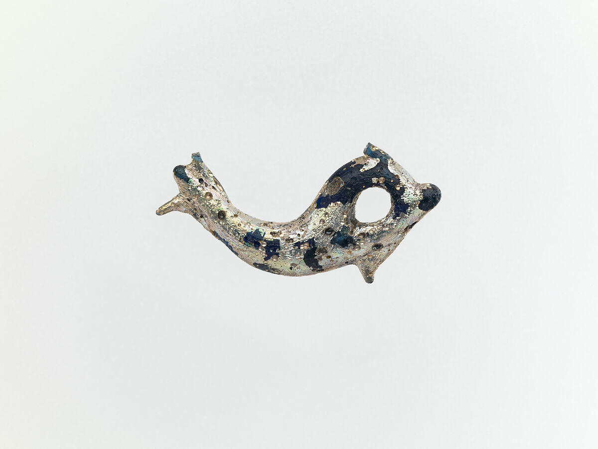 Glass pendant in the form of a dolphin, Glass, Roman