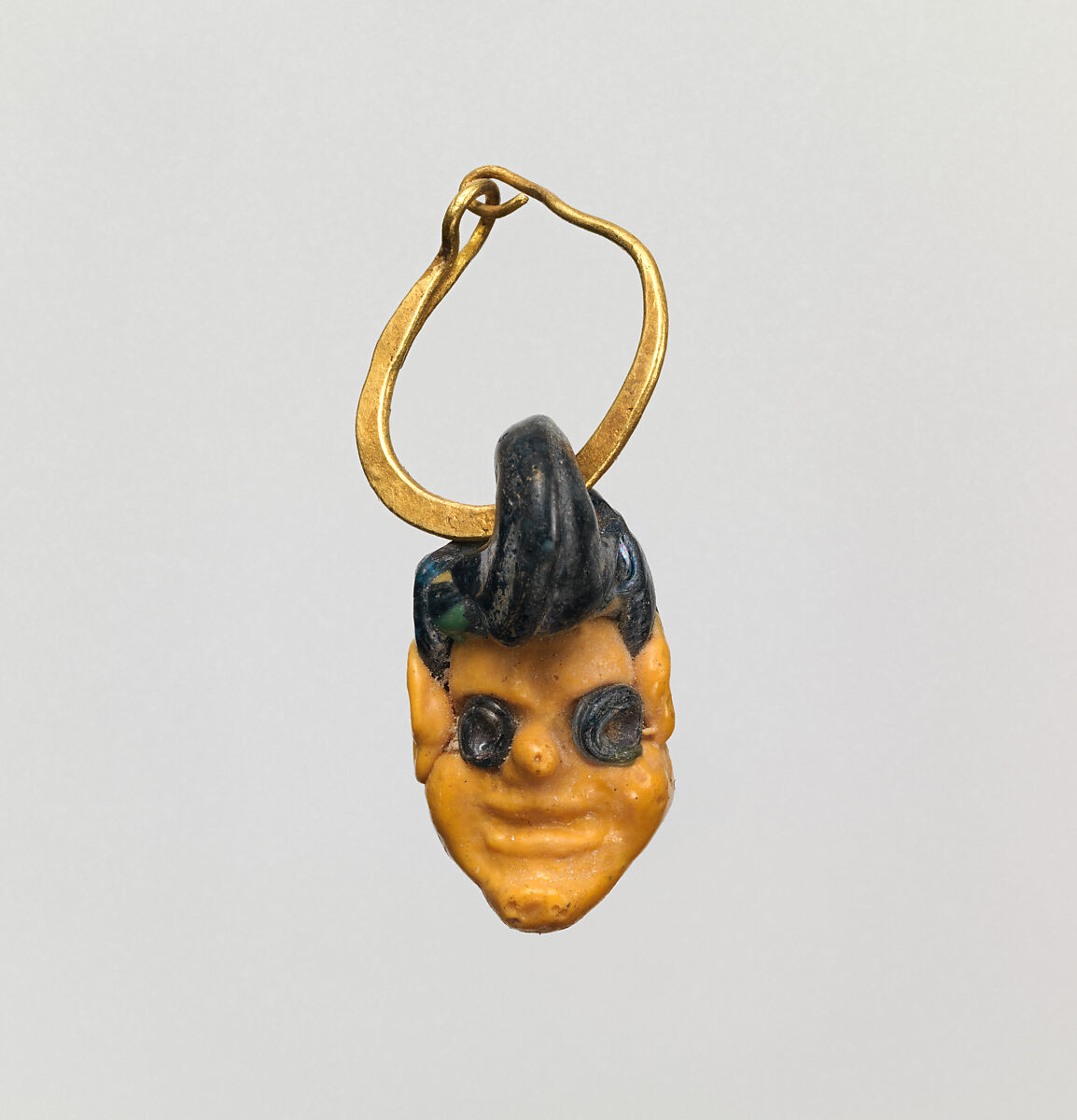 Gold earring with glass head pendant, Gold, glass, Phoenician or Carthaginian 