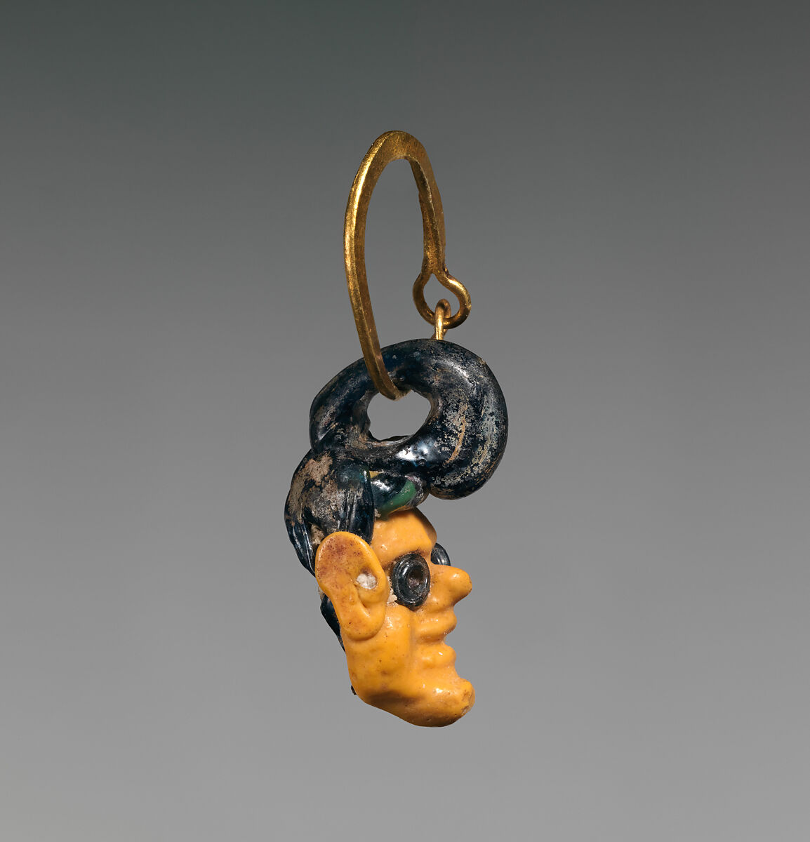 Gold earring with glass head pendant, Gold, glass, Phoenician or Carthaginian