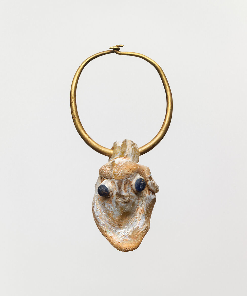 Gold earring with a glass pendant in the form of a demonic mask, Gold, glass, Phoenician or Carthaginian 