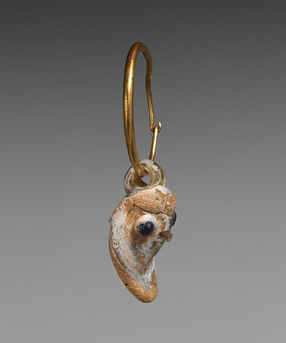 Gold earring with a glass pendant in the form of a demonic mask, Gold, glass, Phoenician or Carthaginian