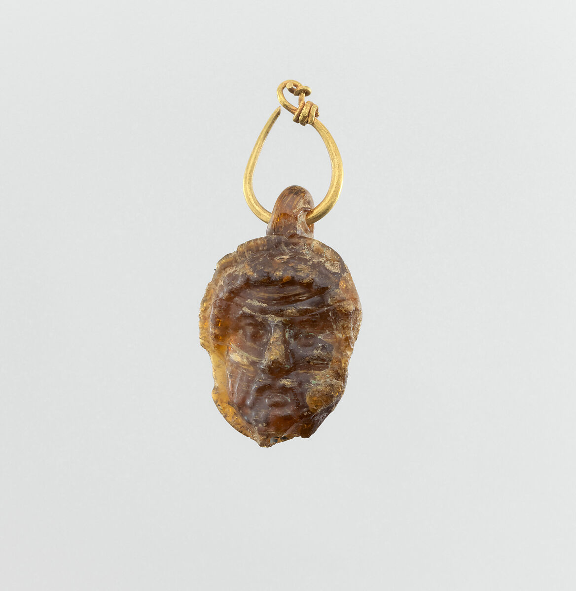 Glass double-headed pendant with gold hoop, Gold, glass, Punic, Western Mediterranean 